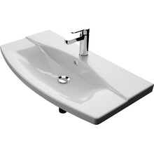 L''image montre un lavabo à poser avec un robinet.