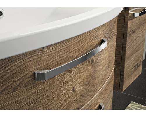 Gros plan d''un meuble sous-lavabo avec structure en bois et poignée