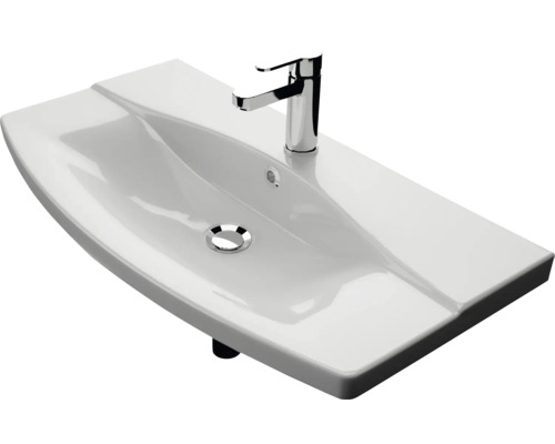 Vasque en céramique avec robinet pour la salle de bains
