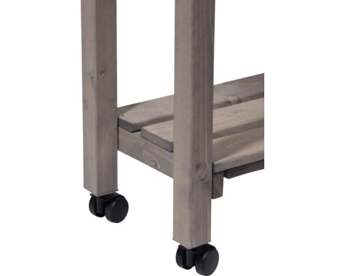 Gros plan d''un chariot de service en bois avec roulettes