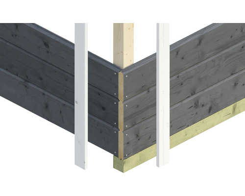 Vue d''angle d''une construction en bois avec un mur en planches