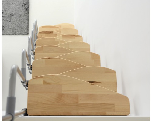 Escalier en bois avec rampe métallique sur mur blanc