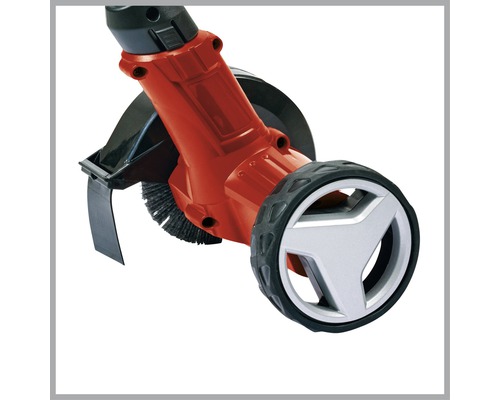 Vue détaillée d''un coupe-bordure avec roue et brosse