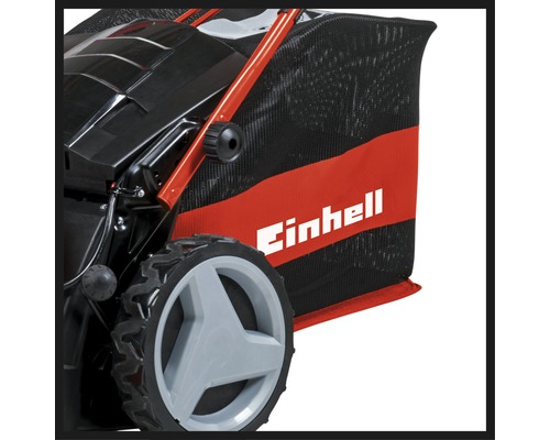 Gros plan d''une tondeuse à gazon Einhell avec bac de ramassage et roue