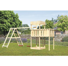 Tour de jeu avec balançoire et échelle dans le jardin