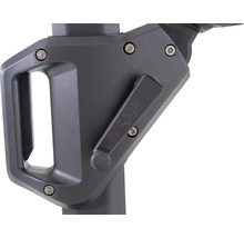 Detailansicht eines Handgriffs mit Hebel zur Bedienung eines Gerätes.