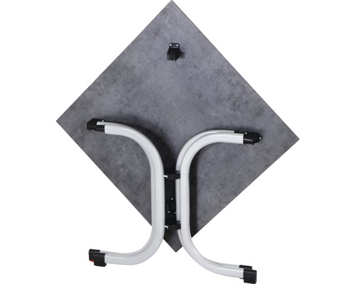 Unterseite eines quadratischen Tisches mit Metallgestell