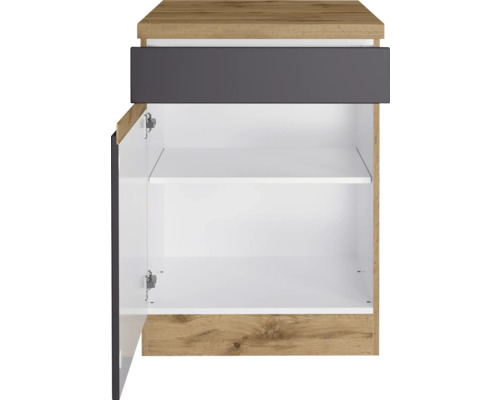 Meuble sous-lavabo avec porte ouverte et deux étagères