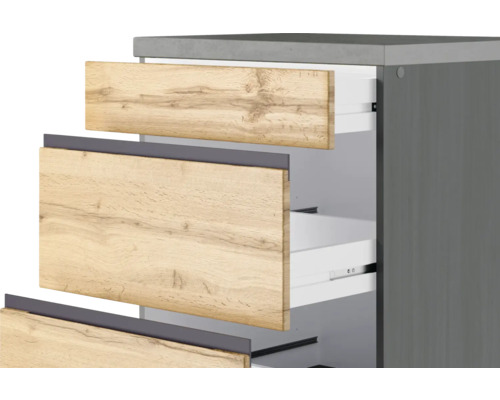 Meuble de salle de bain avec tiroirs ouverts aspect bois