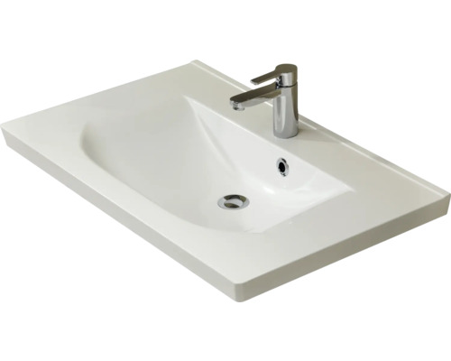 Lavabo en céramique avec robinet pour la salle de bain