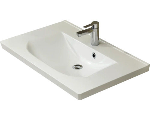 Waschtisch aus Sanitärkeramik mit Armatur