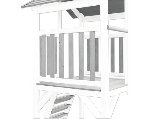 Vue détaillée d''une tour de jeux en bois avec escalier et garde-corps