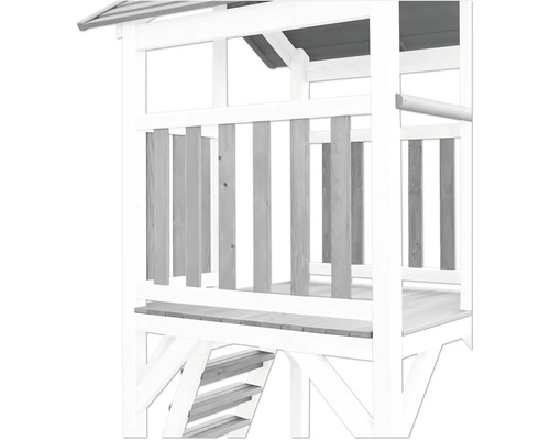 Vue détaillée d''une tour de jeux en bois avec escalier et rambarde