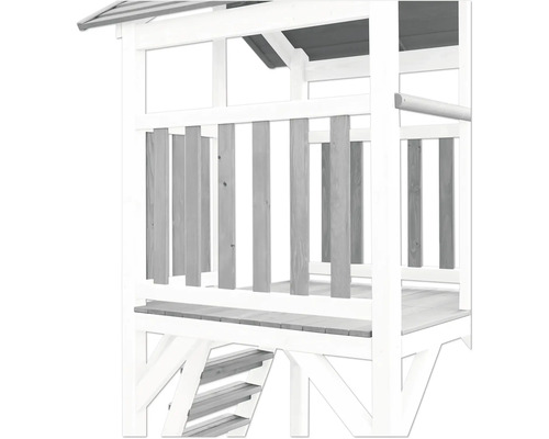 Vue détaillée d''une tour de jeux en bois avec escalier et balustrade