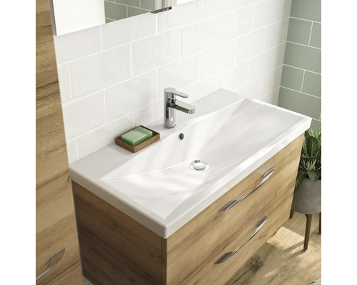 Meuble sous-lavabo avec lavabo, robinet et deux tiroirs dans la salle de bain