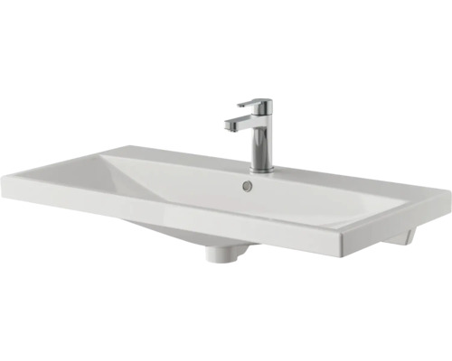 Weisses Aufsatzwaschbecken aus Sanitärkeramik mit Armatur