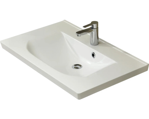 Lavabo en céramique avec robinet