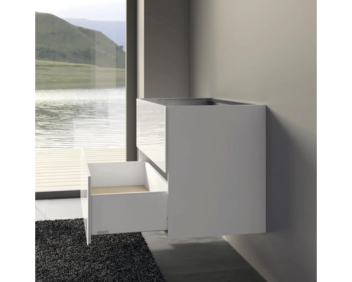 Meuble sous-vasque suspendu avec tiroirs dans la salle de bain