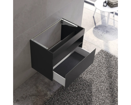 Meuble sous-vasque avec tiroir et compartiment ouvert dans la salle de bain