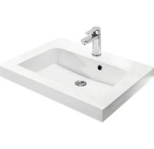Lavabo en céramique avec robinet pour la salle de bain