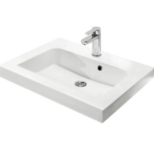 Lavabo en céramique avec robinetterie pour salle de bain