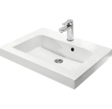Lavabo en céramique avec robinet pour la salle de bain