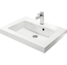 Waschtisch aus Sanitärkeramik mit Armatur