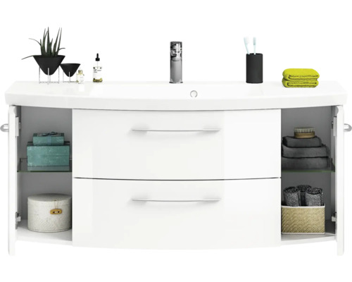 Meuble sous-vasque blanc avec deux tiroirs et compartiments de rangement sur les côtés dans la salle de bains