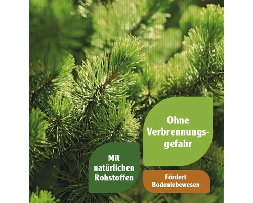 Nadelbaumzweig mit den Hinweisen: Keine Verbrennungsgefahr, mit natürlichen Rohstoffen, fördert Bodenlebewesen