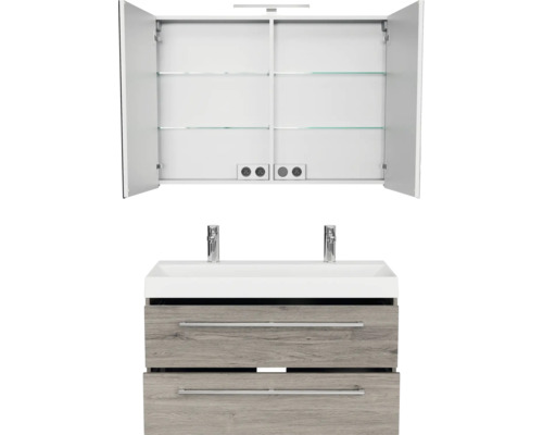 Waschtisch mit zwei Schubladen und Spiegelschrank mit offenen Türen und Einlegeböden.