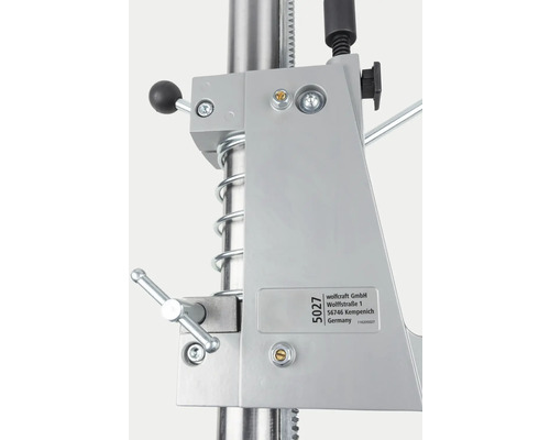 Vue détaillée d''une perceuse avec support et éléments de commande.