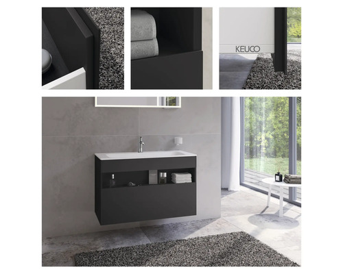 Salle de bains moderne avec meuble sous-lavabo et étagères.