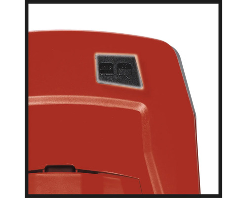 Gros plan sur les commandes d''un broyeur de jardin avec boutons marche/arrêt