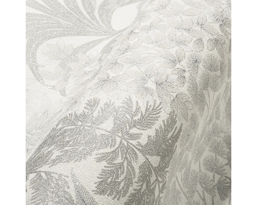Gros plan d''un papier peint à motifs floraux