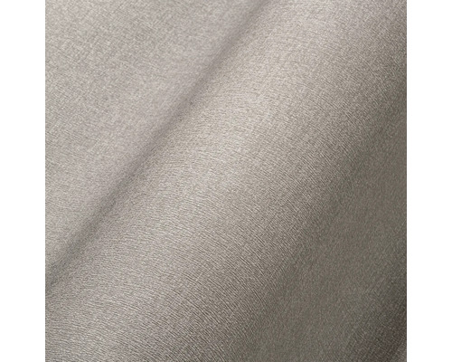 Nahaufnahme einer grauen Vliestapete mit feiner Struktur