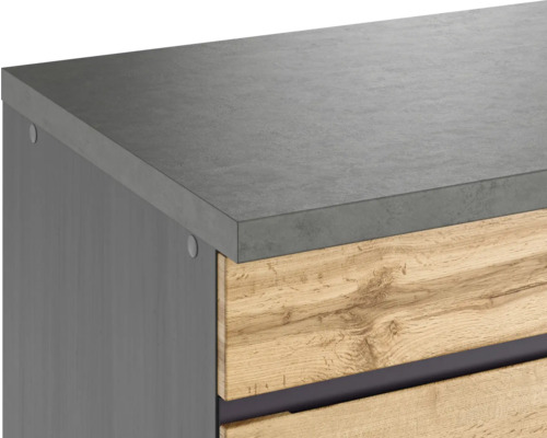 Gros plan d''un meuble de salle de bains avec des tiroirs en bois et un plateau en pierre