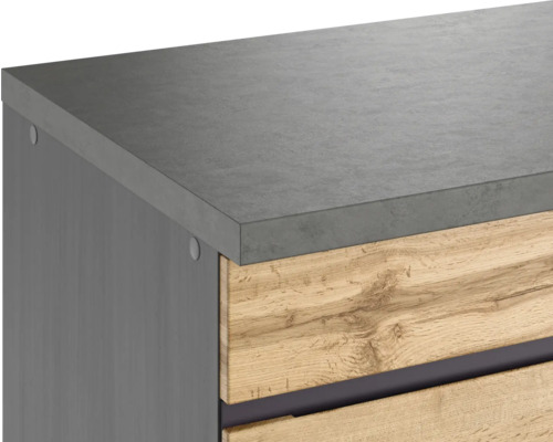 Vue détaillée d''une armoire de salle de bains avec surface en béton et façade en bois