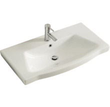 Weisses Keramik Waschbecken mit Armatur