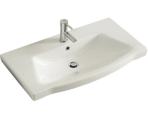 Lavabo en céramique blanche avec robinet