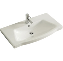 Lavabo en céramique avec robinet