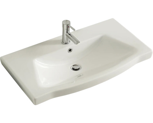 Lavabo en céramique avec robinet