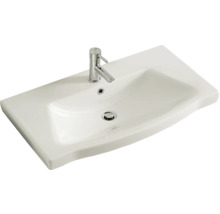 Lavabo en céramique avec robinet