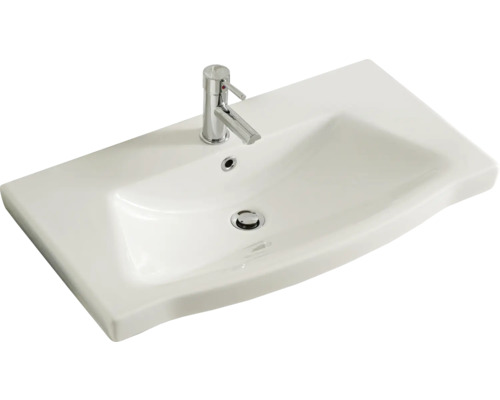 Lavabo en céramique avec robinet