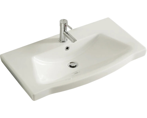 Lavabo en céramique avec robinet