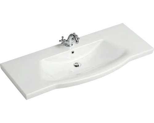 Vasque en céramique blanche avec robinet