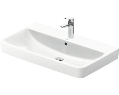 Lavabo en céramique blanc avec robinet