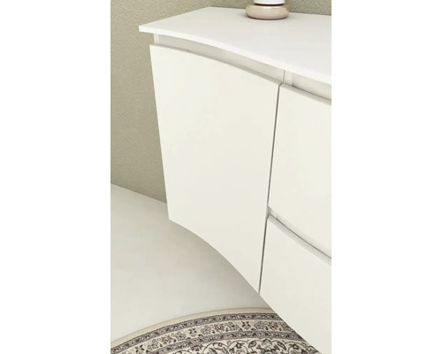 Vue détaillée d''un meuble de salle de bains blanc avec portes incurvées