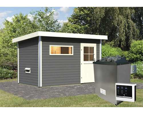 Sauna avec poêle et panneau de commande dans le jardin.