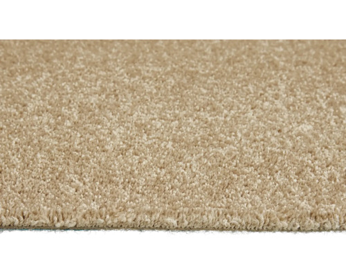 Nahaufnahme eines beigen Teppichs