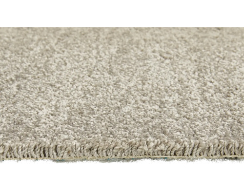 Gros plan d''un tapis beige à poils longs